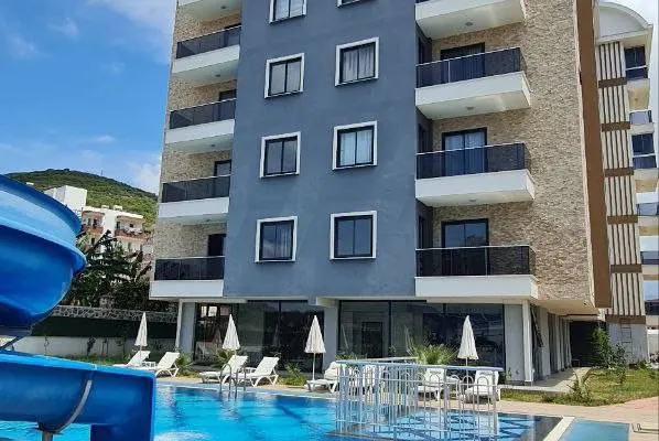 Furnished apartment with pool view in a modern residential complex in Gazipaşa