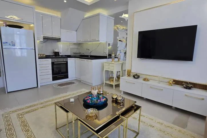 A spacious furnished penthouse with a terrace in the popular Mahmutlar area near the sea
