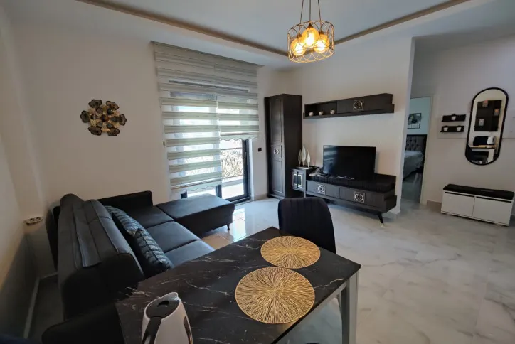 1+1 leilighet i Mahmutlar, Alanya – 56 m², 1. etasje, kjøp ved sjøen til en god pris