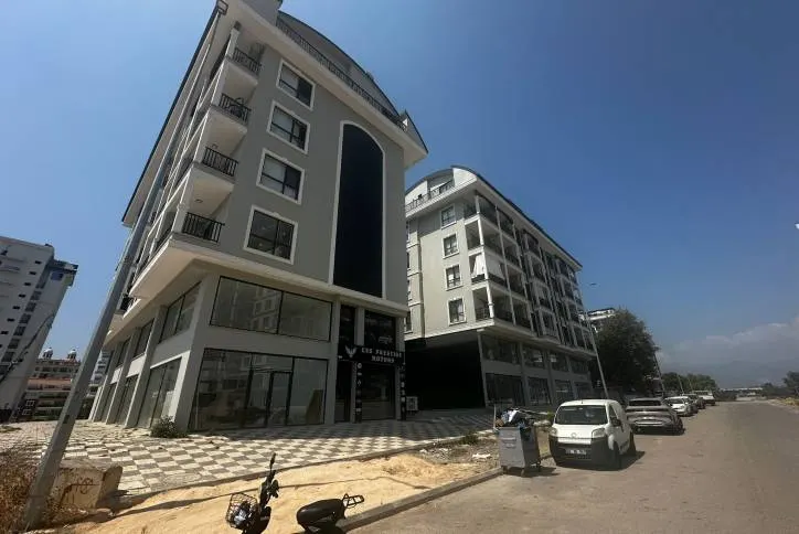 Modern 1+1 apartment with a pool and fitness center in Mahmutlar