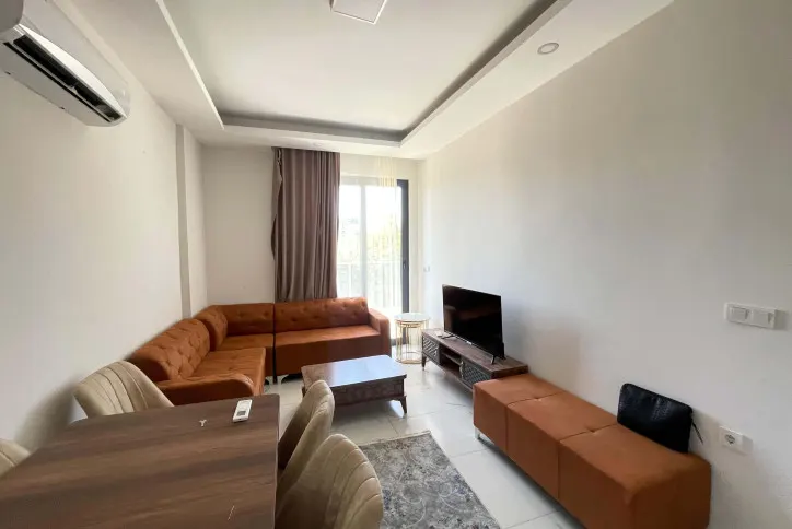 Modern 1+1 furnished apartment in Mahmutlar