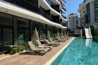 1+1 apartment in a new building built in 2024 near the sea