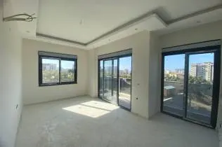 A modern 1+1 apartment in a residence with full amenities in Mahmutlar
