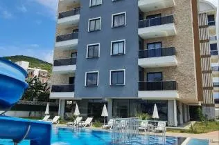 Furnished apartment with pool view in a modern residential complex in Gazipaşa
