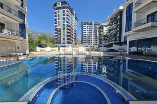 New 1+1 apartment in Mahmutlar without furniture