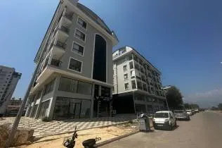 Modern 1+1 apartment with a pool and fitness center in Mahmutlar