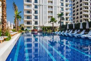 3+1 apartment in a luxury complex by the sea for a residence permit